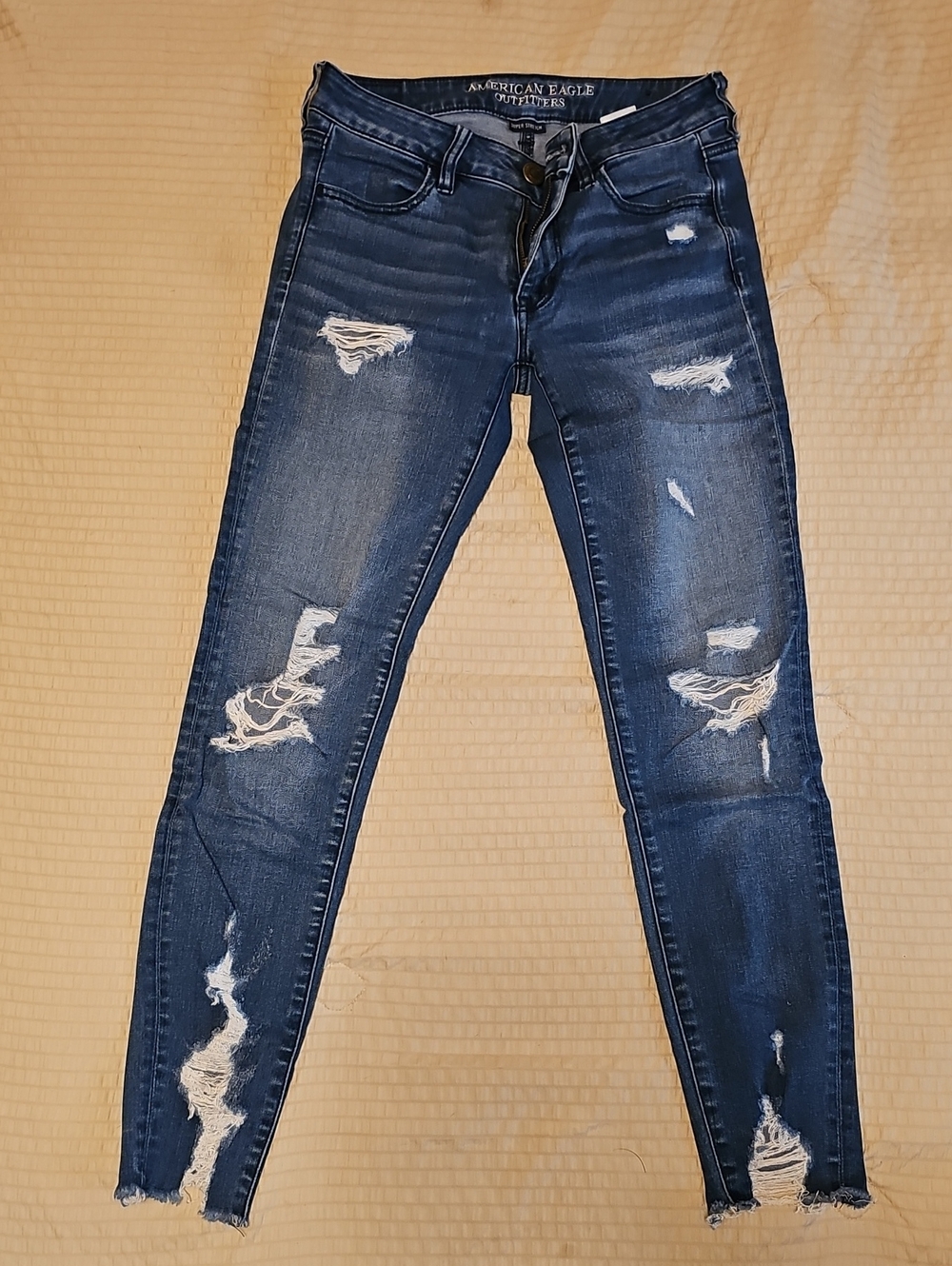 AE Dark Blue Distressed Skinny Jeans